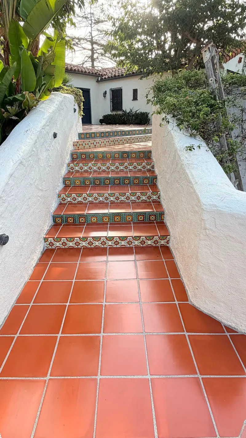 Saltillo stairs with patterned tile risers