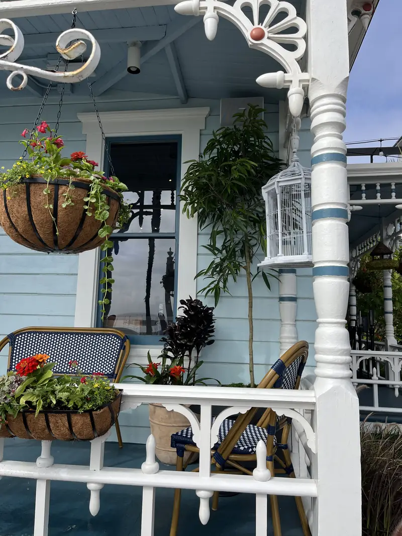 Hanging baskets on a Victorian porch